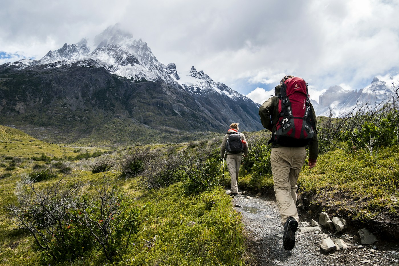 Hiker overlooking a mountain landscape